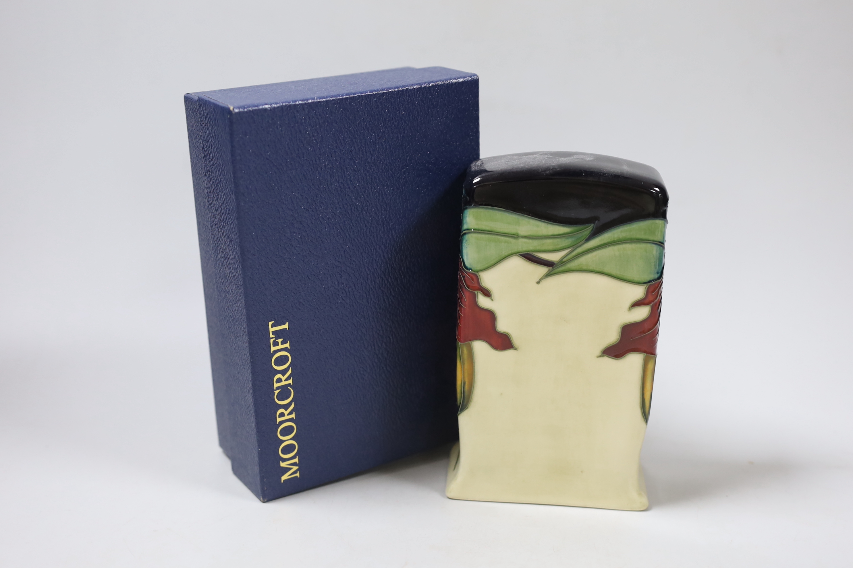 A boxed Moorcroft mantel timepiece, 16cm high